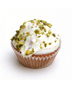 Magdalenas caseras de aceite de oliva virgen extra rellenas de pistacho y cubiertas de chocolate blanco